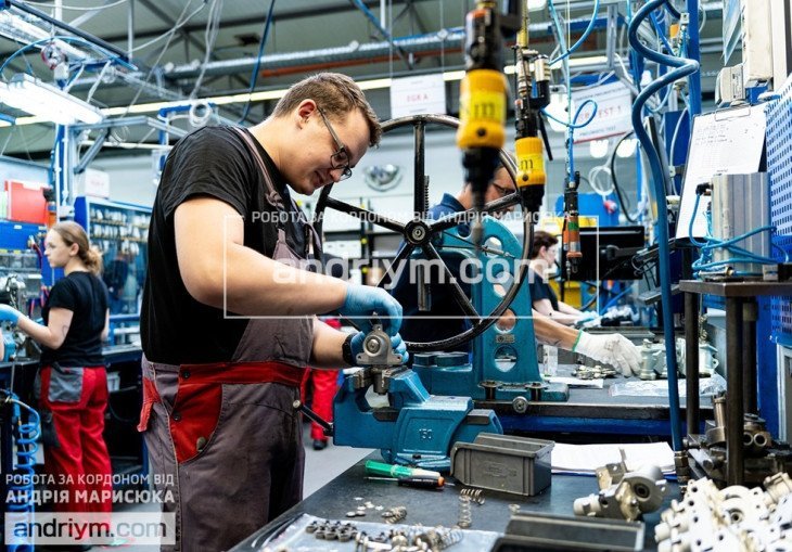 Automotive parts processing worker