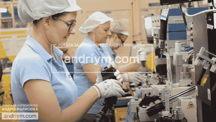 Worker at automotive parts production