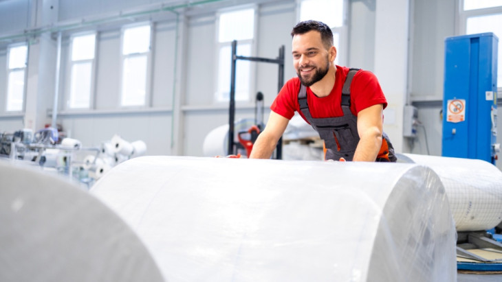 Worker at paper products production